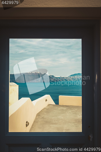 Image of Window with view of Thira and caldera of Santorini volcano
