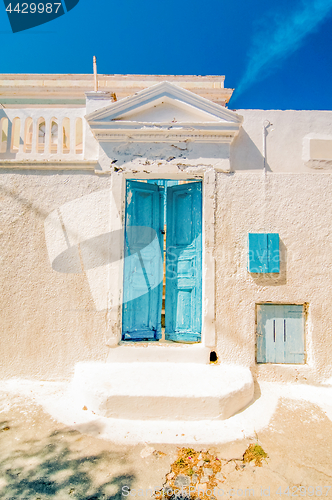 Image of Typical blue door in Emporio on the island of Santorini, Greece, Southern Europe