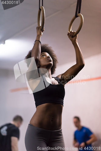 Image of black woman doing dipping exercise