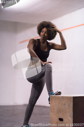 Image of black woman are preparing for box jumps at gym