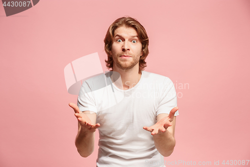 Image of Beautiful male half-length portrait isolated on pink