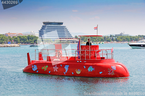 Image of Red Semi-submarine with glass bottom so tourists can see the mar