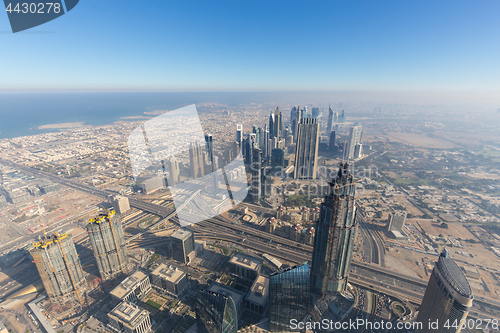 Image of Aerial view of Downtown Dubai from Burj Khalifa, Dubai, United Arab Emirates.