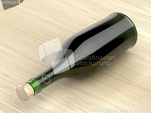 Image of Champagne bottle on wood table