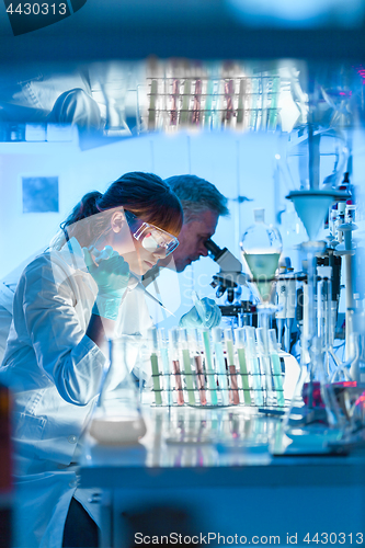 Image of Health care researchers working in scientific laboratory.