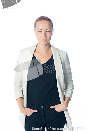 Image of Business woman standing against white background.