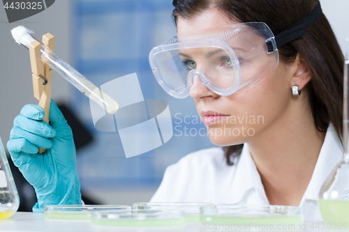 Image of Health care professional researching in scientific laboratory.