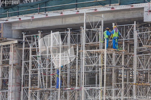 Image of Team of construction worker on construction site.