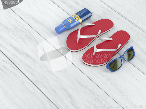 Image of Flip-flops, sun cream and sunglasses