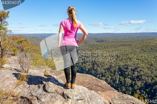 Image of Bush walker admiring views high above the river