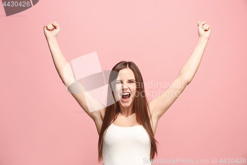 Image of Winning success woman happy ecstatic celebrating being a winner. Dynamic energetic image of female model