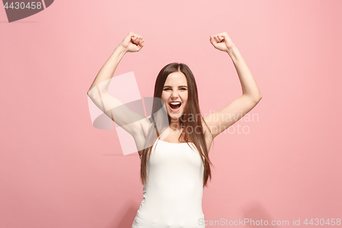 Image of Winning success woman happy ecstatic celebrating being a winner. Dynamic energetic image of female model