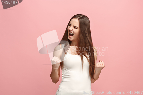 Image of Winning success woman happy ecstatic celebrating being a winner. Dynamic energetic image of female model