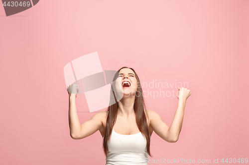 Image of Winning success woman happy ecstatic celebrating being a winner. Dynamic energetic image of female model