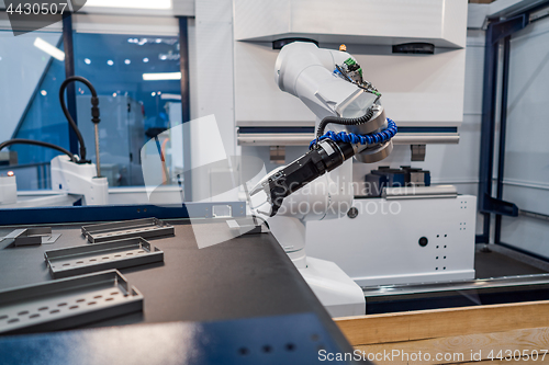 Image of Robotic Arm modern industrial technology. Automated production c