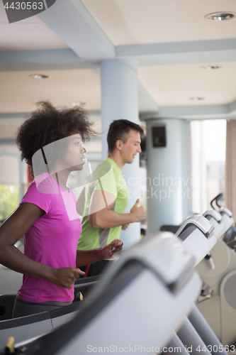 Image of people exercisinng a cardio on treadmill in gym