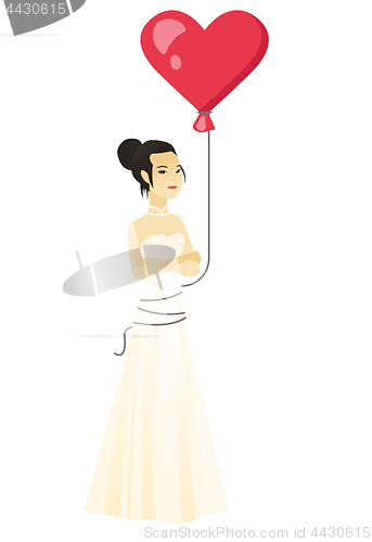 Image of Serious bride with a heart-shaped red balloon.