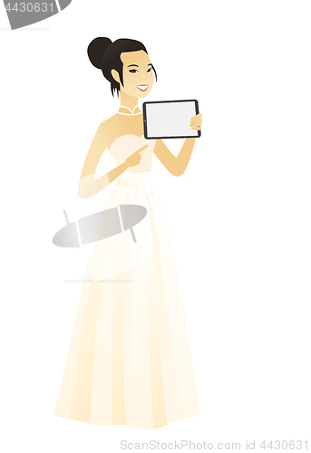 Image of Smiling fiancee holding tablet computer.