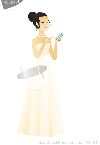 Image of Asian fiancee holding a mobile phone.