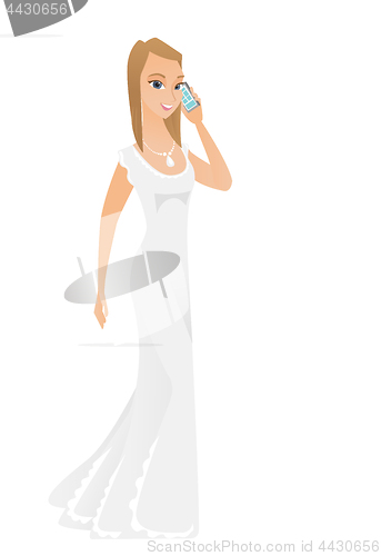 Image of Fiancee talking on a mobile phone.