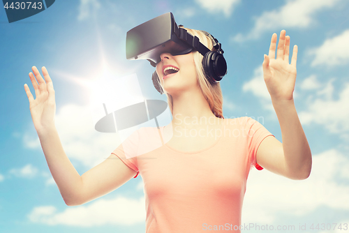 Image of woman in virtual reality headset or 3d glasses