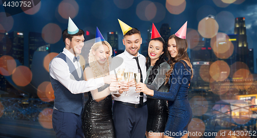 Image of friends with champagne glasses at birthday party