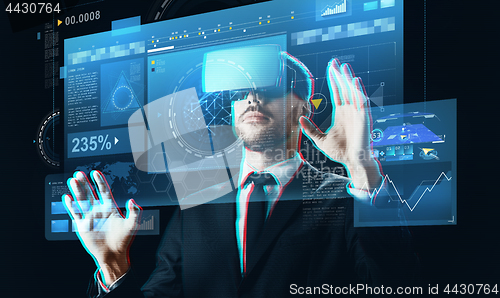 Image of businessman in virtual reality headset with screen