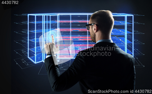 Image of businessman with virtual construction project