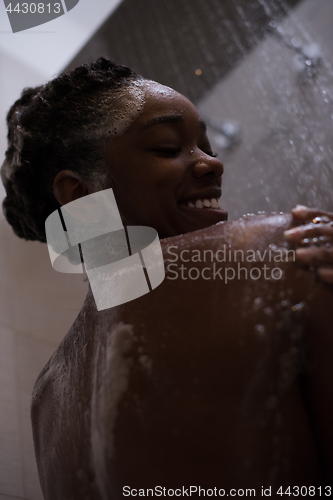 Image of African American woman in the shower