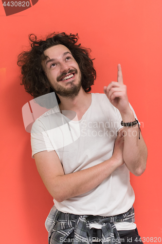 Image of young man with funny hair over color background