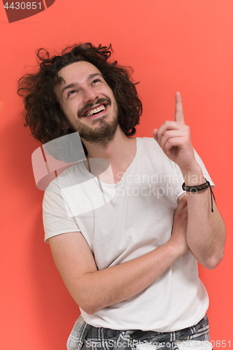 Image of young man with funny hair over color background