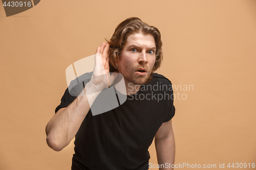 Image of The happy businessman standing and young man listening