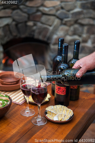 Image of Pouring red wine