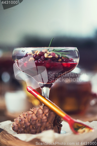 Image of dessert from beriies with pine seed