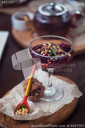 Image of dessert from beriies with pine seed