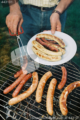 Image of Sausages on Barbecue BBQ grill