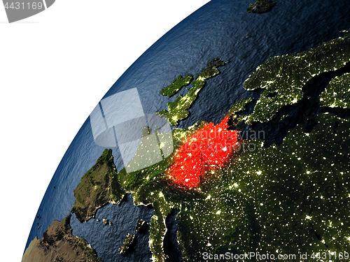 Image of Germany in red on Earth at night