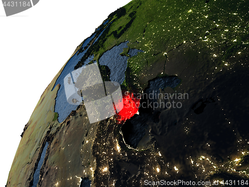 Image of Azerbaijan in red on Earth at night