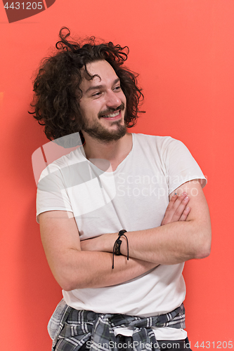 Image of young man with funny hair over color background