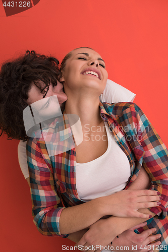 Image of couple in love  over color background