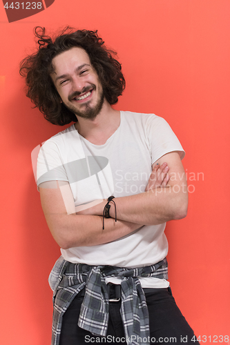 Image of young man with funny hair over color background