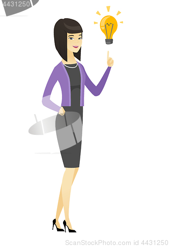 Image of Business woman pointing at business idea bulb.