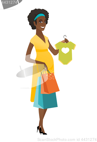 Image of Pregnant woman showing baby bodysuit.