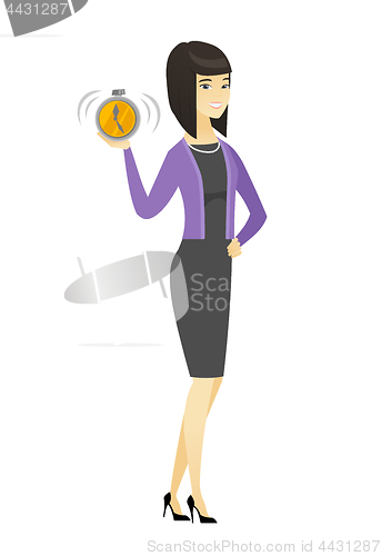 Image of Asian business woman holding alarm clock.