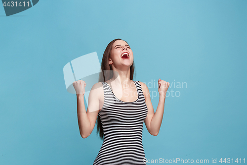 Image of Winning success woman happy ecstatic celebrating being a winner. Dynamic energetic image of female model