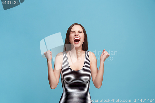 Image of Winning success woman happy ecstatic celebrating being a winner. Dynamic energetic image of female model