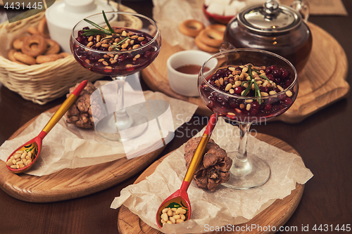 Image of dessert from beriies with pine seed