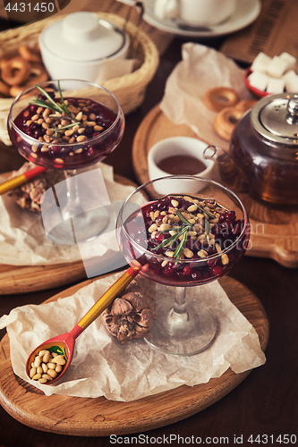 Image of dessert from beriies with pine seed