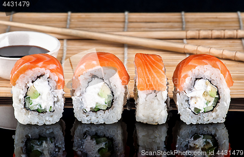 Image of Philadelphia Sushi roll in a row