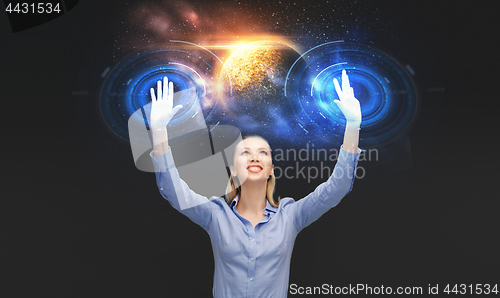 Image of businesswoman with virtual space hologram